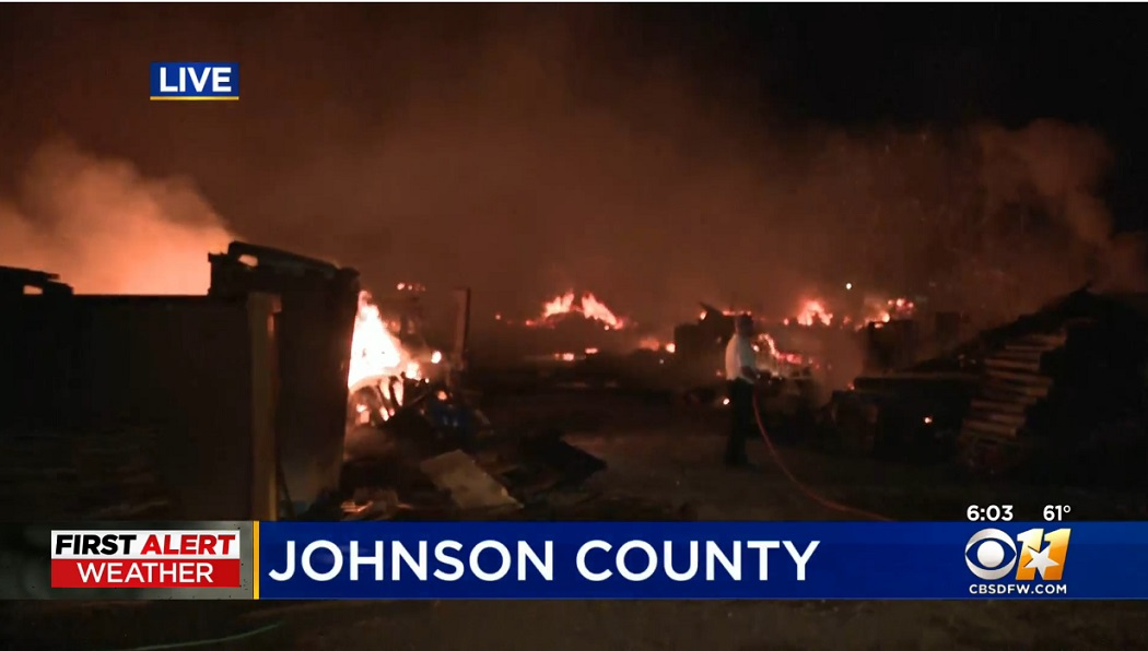 Firefighters near Alvarado battling a massive pallet fire had to seek shelter as a tornado passed overhead.