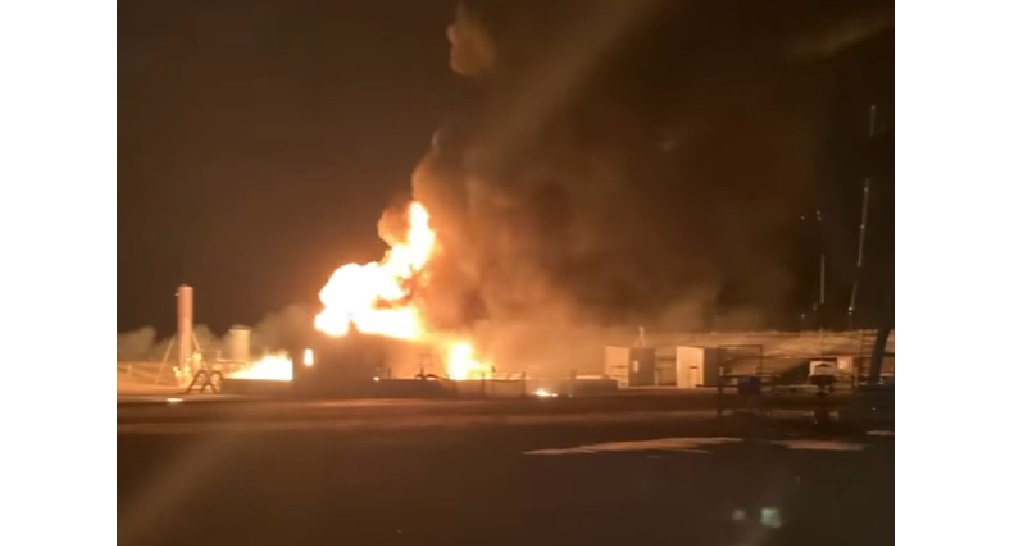 Firefighters with the Campbell County Fire Department battle a fire involving a well and structure.