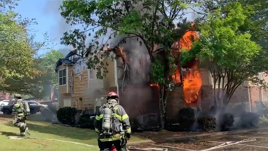 Columbia-Richland firefighters battled a two-alarm fire that caused heavy damage to an apartment building
