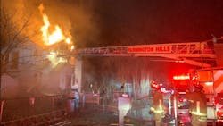 Farmington Hills firefighters rescued a 62-year-old woman from the second floor of her burning home. Farmington Hills firefighters rescued a 62-year-old woman from the second floor of her burning home.