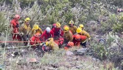 Search and Rescue crews from Cal-Fire and Mariposa County Sheriffs Office rescued a father and son after dropping off a cliff 400-500 feet. Search and Rescue crews from Cal-Fire and Mariposa County Sheriffs Office rescued a father and son after dropping off a cliff 400-500 feet.