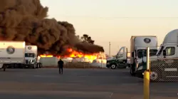 Texas firefighters spent roughly six hours battling a blaze that completely destroyed a large commercial building at Viking Pools.