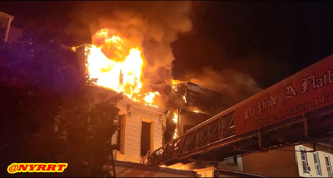 Seven people were injured at an early morning dwelling fire in Brooklyn that spread to an adjacent dwelling.