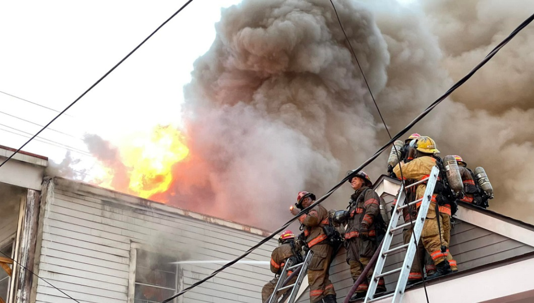 New Orleans firefighters battled a massive 4-alarm fire that damaged multiple structures and left close to a dozen homeless.
