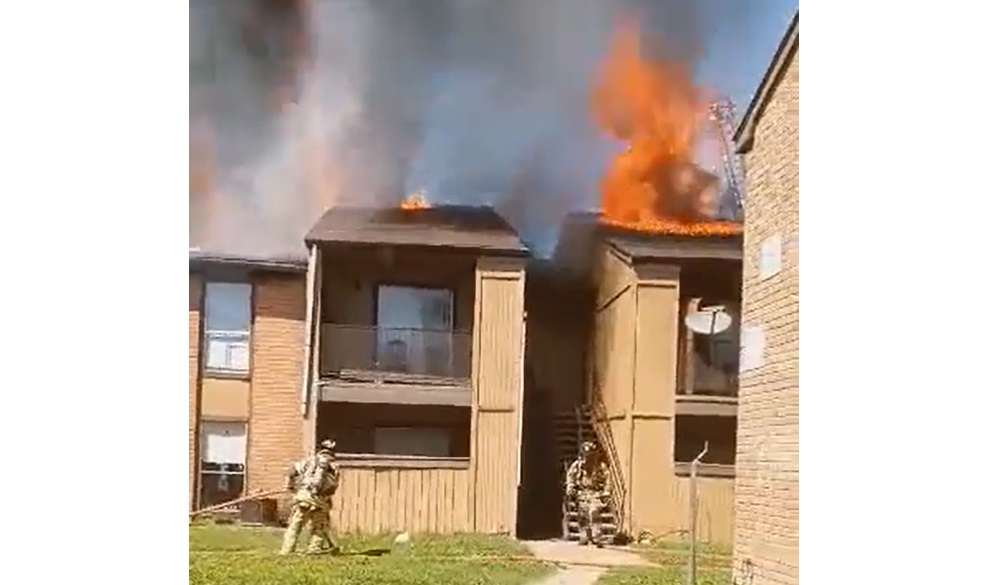 Houston firefighters battle a two-alarm apartment fire that left one firefighter injured and damaged 16 units.