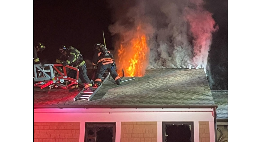 Three people were forced to jump to safety and 50 pets were rescued at a multiple occupancy building fire in Westport.
