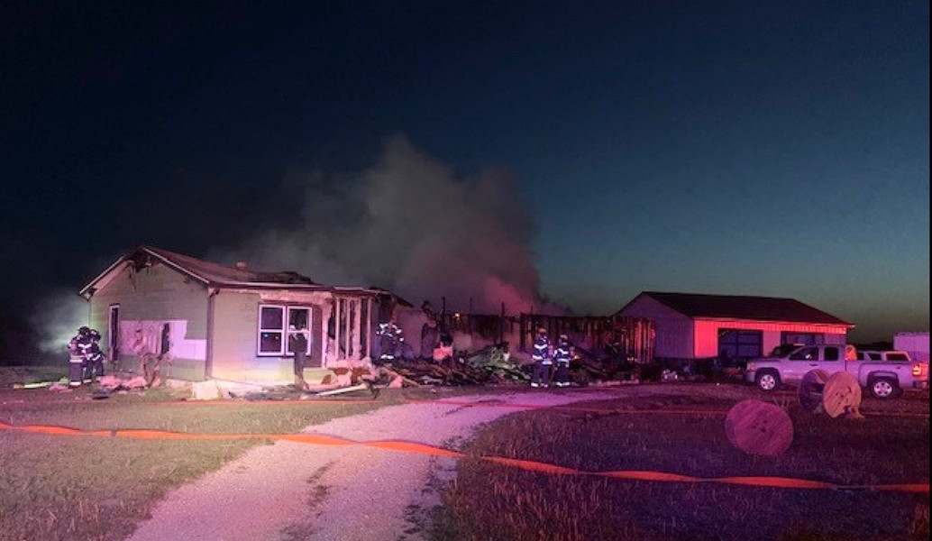 Fire destroyed a home northwest of Wichita that belonged to the parents of a Wichita firefighter.