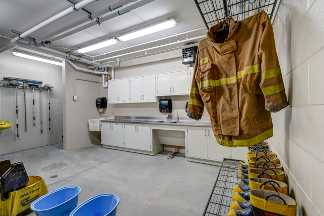 Members who operate out of existing firehouses don’t need to feel that their die is cast when it comes to their exposure to contaminants because a renovation of their station isn’t in the cards. Numerous simple, inexpensive actions can have a significant positive effect. For example, contaminated gear shouldn’t be stored in the apparatus bay, even for short periods of time and particularly not out in the open. It should be separated from personnel, equipment and other materials.