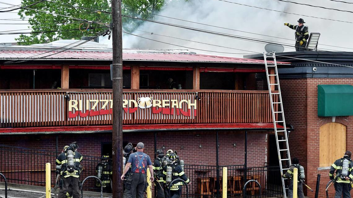 Firefighters were able to stop the fire before it spread through voids to adjacent businesses.