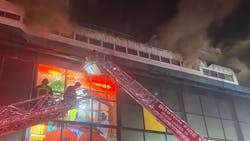 Boston firefighters battle the six-alarm fire at Suffolk Downs Monday night. Boston firefighters battle the six-alarm fire at Suffolk Downs Monday night.