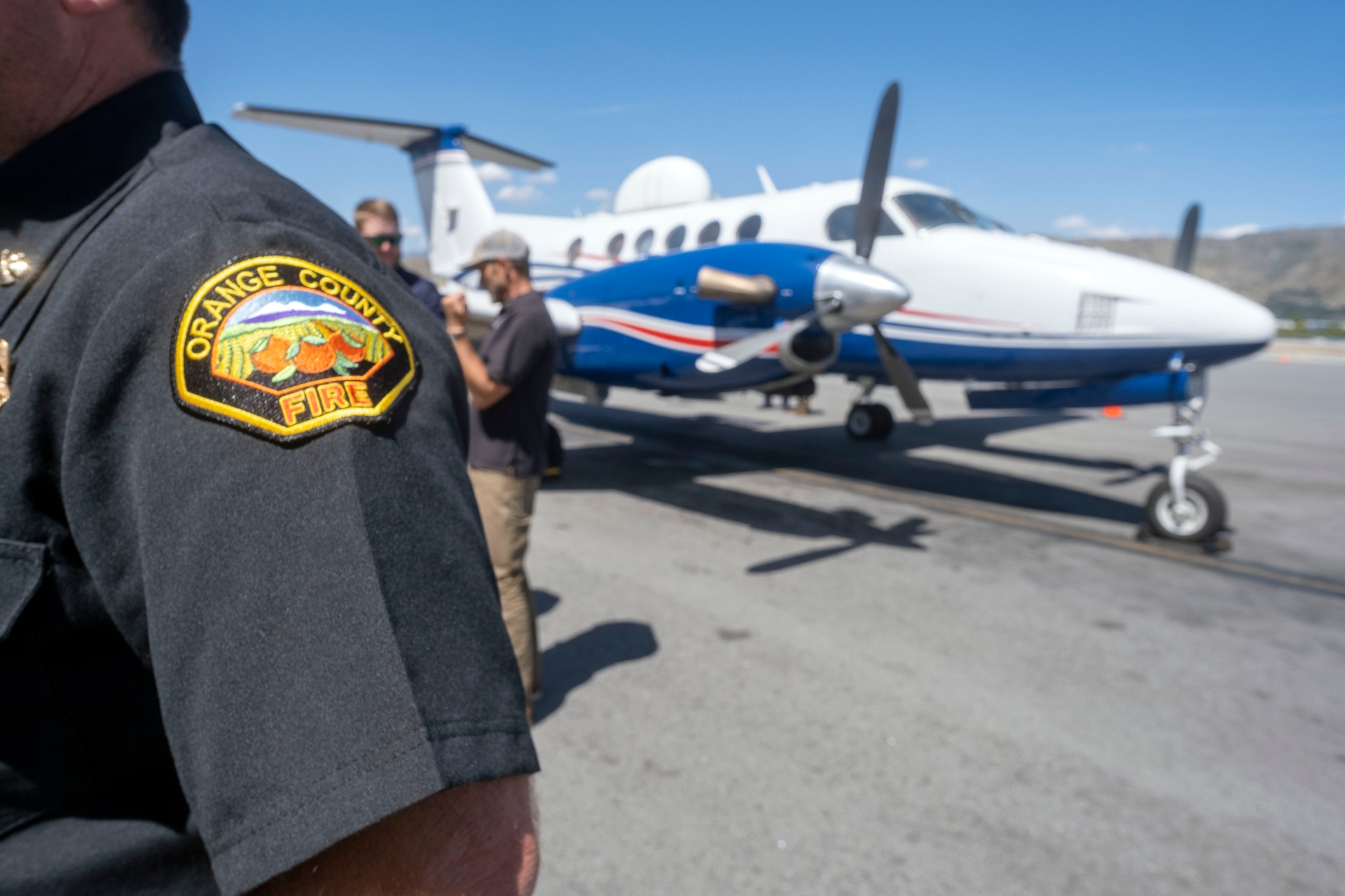 The Fire Integrated Real-time Intelligence System (FIRIS) airplane on display on the tarmac at Burbank Airport.