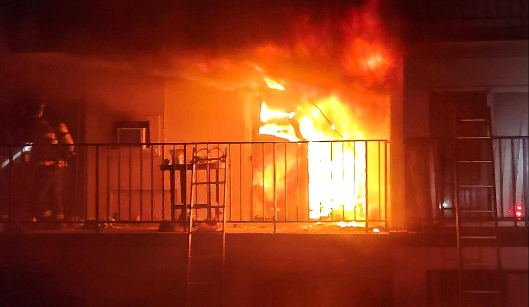 Indianapolis firefighters rescued multiple people using ground ladders at an early morning apartment fire.