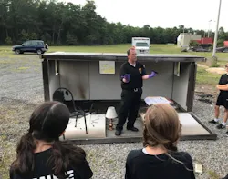 Deputy Fire Marshal Van Marter explains to the recruits how an investigation is done following a fire.