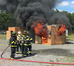 Chief Leaming and the instructors preparing to extinguish the live burn in preparation for the investigation lesson from the Ocean County Fire Marshals.