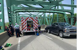 Four West Virginia Fire Departments worked together to effect a successful under-bridge rescue.