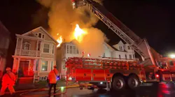 Troy firefighter battled a massive blaze that damaged multiple dwellings during a two-alarm fire.