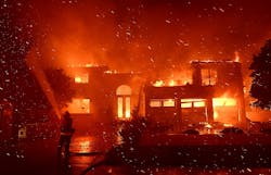 Firefighters battle a brush fire at Coronado Pointe in Laguna Niguel, California, on Wednesday, May 11, 2022. Firefighters battle a brush fire at Coronado Pointe in Laguna Niguel, California, on Wednesday, May 11, 2022.