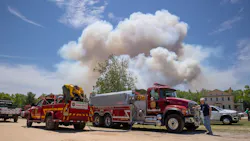 Smoke bellows from a fire burning in the Wharton State Forest, on Monday. Smoke bellows from a fire burning in the Wharton State Forest, on Monday.