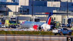 Firefighters at the scene where an MD80 crash landed and caught fire at Miami's airport. Firefighters at the scene where an MD80 crash landed and caught fire at Miami's airport.