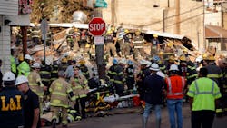 Philadelphia firefighters at the building collapse Saturday morning. Philadelphia firefighters at the building collapse Saturday morning.
