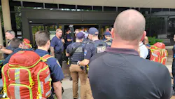 Police and other emergency crews gather at the Natalie Medical Building in Tulsa where four people were fatally shot.