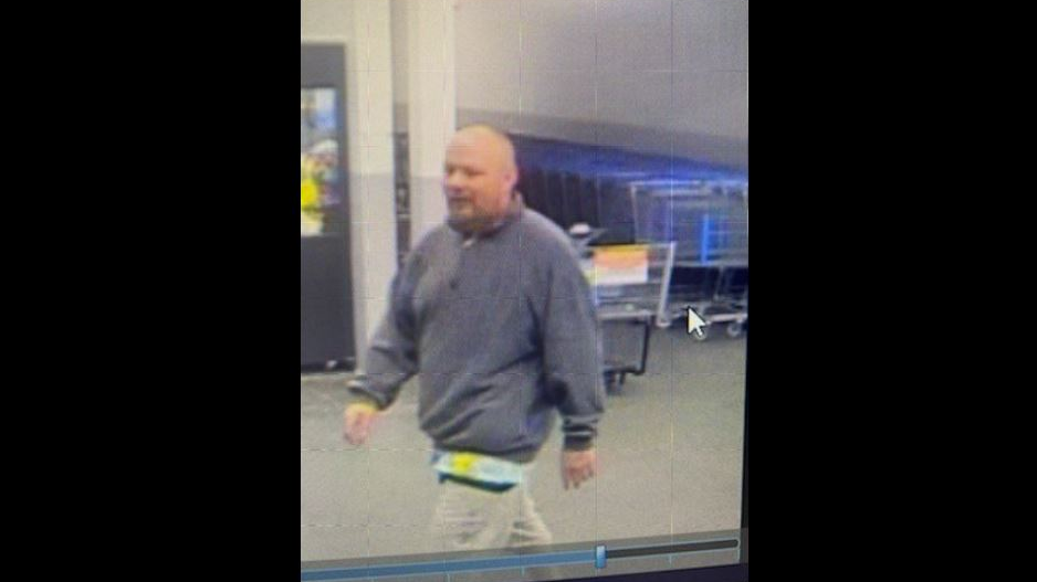 Kennewick Police released this photo of a man who is suspected of setting a pile of towels on fire at a Walmart.