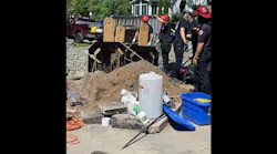 St. Paul firefighters worked for almost 12 hours to recover one of the workers who was buried when the trench collapsed.