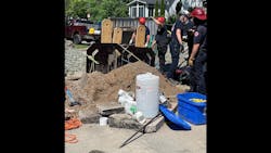 St. Paul firefighters worked for almost 12 hours to recover one of the workers who was buried when the trench collapsed. St. Paul firefighters worked for almost 12 hours to recover one of the workers who was buried when the trench collapsed.