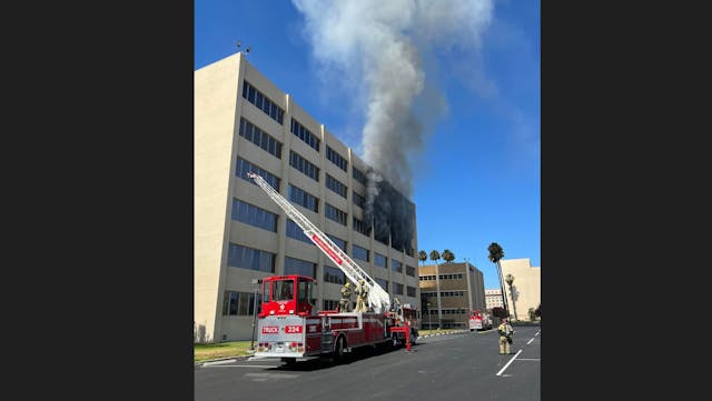 Firefighters battled the three-alarm fire at the San Bernardino County Code Enforcement building.