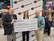 Ray Sharrah (left), President and Chief Executive Officer of Streamlight and Dawn Dalldorf-Jackson, Streamlight&rsquo;s Vice President of Distribution &amp; Business Development, present a $17,500 donation check to NFFF Executive Director Chief Ronald Siarnicki (right) in support of the National Fallen Firefighter&rsquo;s Foundation.
