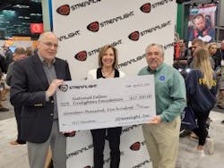 Ray Sharrah (left), President and Chief Executive Officer of Streamlight and Dawn Dalldorf-Jackson, Streamlight’s Vice President of Distribution & Business Development, present a $17,500 donation check to NFFF Executive Director Chief Ronald Siarnicki (right) in support of the National Fallen Firefighter’s Foundation. Ray Sharrah (left), President and Chief Executive Officer of Streamlight and Dawn Dalldorf-Jackson, Streamlight’s Vice President of Distribution & Business Development, present a $17,500 donation check to NFFF Executive Director Chief Ronald Siarnicki (right) in support of the National Fallen Firefighter’s Foundation.