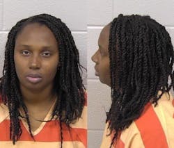 Darlene Nicole Brister, 40, is charged with two counts of malice murder and is being held without bond in a Paulding County jail. Her charges stem from a house fire in which three children died and another was hospitalized with burn wounds, Paulding fire officials confirmed.
