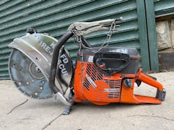 Attaching a pair of locking pliers and chain to the handle of a rotary saw allows the saw operator to quickly hand the tools to another member for use when cutting of a lock that has exposed shackles is required. Attaching a pair of locking pliers and chain to the handle of a rotary saw allows the saw operator to quickly hand the tools to another member for use when cutting of a lock that has exposed shackles is required.