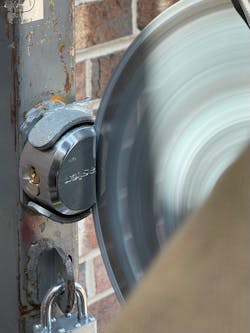 Most of the time, hockey-puck-style locks and shielded pins go together. When cutting any lock with a rotary saw, you must be accustomed to combatting the gyroscopic forces that the saw generates.