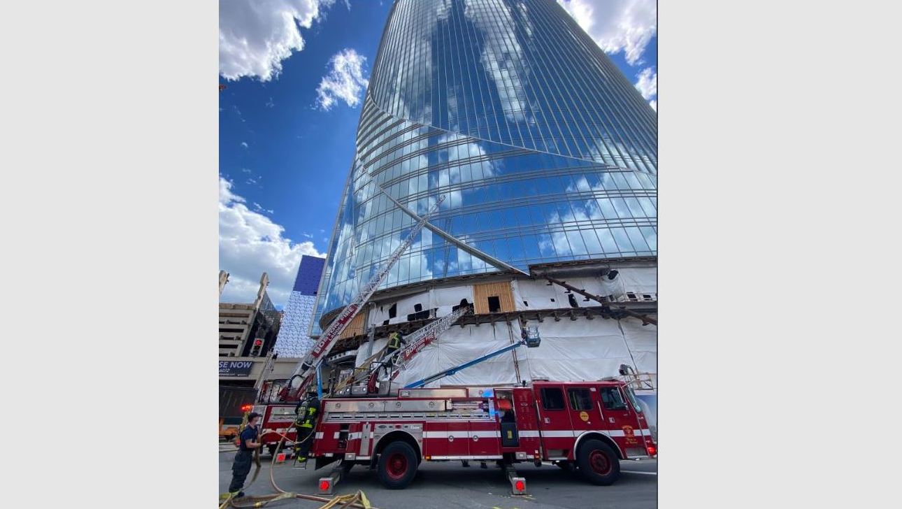 Boston firefighters battled a four-alarm fire in a building under construction Saturday.