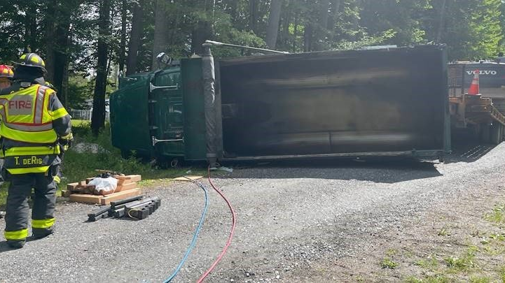 Great Barrington firefighters lifted the truck off the driver and freed him 10 minutes after they arrived.