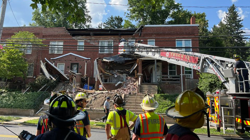 Lower Allen firefighters operate at the house collapse Friday afternoon.