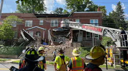 Lower Allen firefighters operate at the house collapse Friday afternoon.