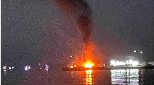 A fire boat was used to contain the fire on the fireworks barge near Westport.