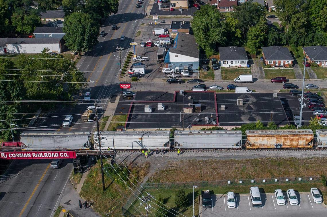 Law enforcement members respond to a report of a person being struck by a train near North Broadway in Lexington, Ky., on Friday, July 15, 2022.