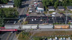 Law enforcement members respond to a report of a person being struck by a train near North Broadway in Lexington, Ky., on Friday, July 15, 2022.