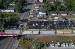 Law enforcement members respond to a report of a person being struck by a train near North Broadway in Lexington, Ky., on Friday, July 15, 2022.