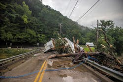 A house rests on a bridge near the Whitesburg Recycling Center in Letcher County, Ky., on Friday, July 29, 2022.