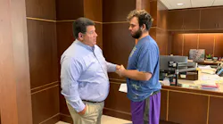 Lafayette Mayor Tony Roswarski (l.) thanks Nicholas Bostic for his heroic actions in saving five children from a burning home.