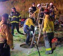 Had Con Fire’s Plan A been utilized to rescue the victim, members would have entered the drainage pipe directly. Even though Plan B was used, rescuers still employed the direct access point to construct a strut and extension to use heavy lifting chain to remove a water-constricting plate that was situated between the vault and the drainage pipe. Had Con Fire’s Plan A been utilized to rescue the victim, members would have entered the drainage pipe directly. Even though Plan B was used, rescuers still employed the direct access point to construct a strut and extension to use heavy lifting chain to remove a water-constricting plate that was situated between the vault and the drainage pipe.