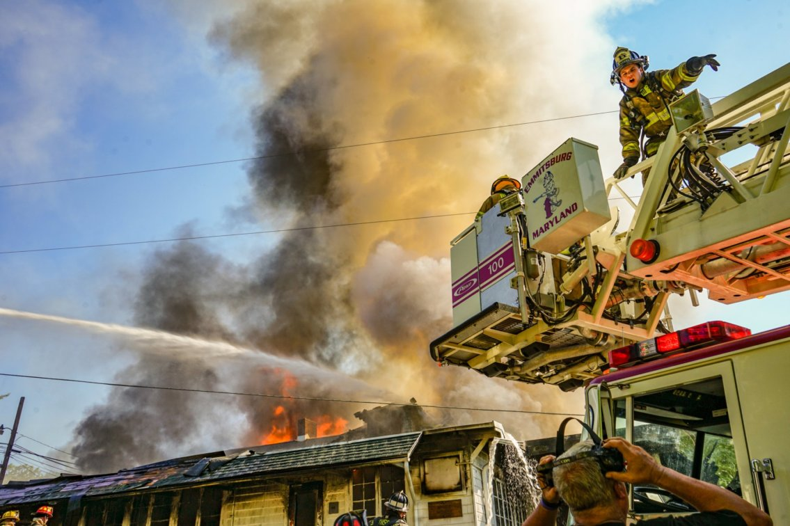 Firefighters from Frederick County work to gain the upper hand on the fire that ripped through the Camp Airy dining hall in Thurmont.