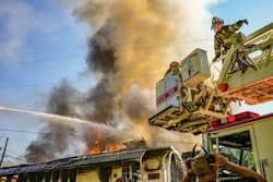Firefighters from Frederick County work to gain the upper hand on the fire that ripped through the Camp Airy dining hall in Thurmont. Firefighters from Frederick County work to gain the upper hand on the fire that ripped through the Camp Airy dining hall in Thurmont.