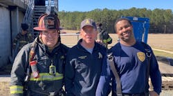 Apex Fire Department’s Training Coordinator John White (center) was named the winner of the 2022 VCOS Training Officer Award. White is pictured here with Lt. Ryan Arnett (left) and Lt. Antonio Fuller during an event at the agency’s training center. Apex Fire Department’s Training Coordinator John White (center) was named the winner of the 2022 VCOS Training Officer Award. White is pictured here with Lt. Ryan Arnett (left) and Lt. Antonio Fuller during an event at the agency’s training center.