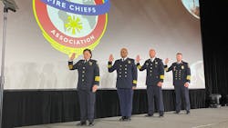 IAFC President Chief Donna Black (left to right), 1st Vice President Chief John Butler, 2nd Vice President Chief Josh Waldo, and Treasurer Chief Steven Locke. IAFC President Chief Donna Black (left to right), 1st Vice President Chief John Butler, 2nd Vice President Chief Josh Waldo, and Treasurer Chief Steven Locke.