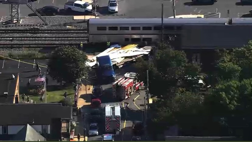 A rig loaded with lumber was struck at a Maryland crossing Wednesday.